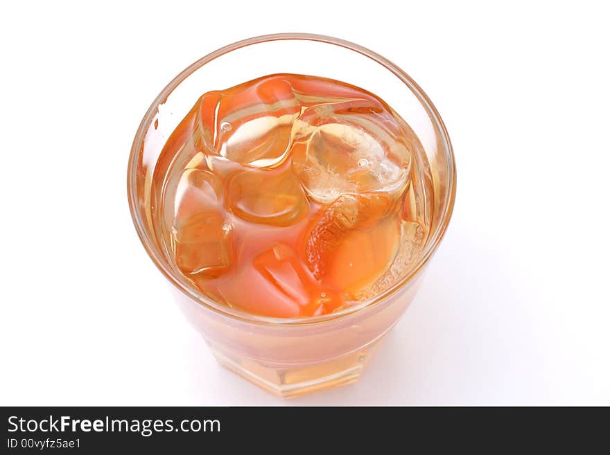 Whiskey in a glass. Isolated on a white background