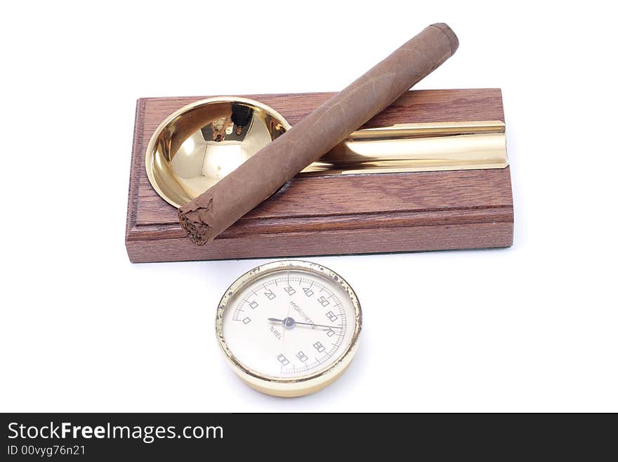 Cigar and ashtray isolated on a white background