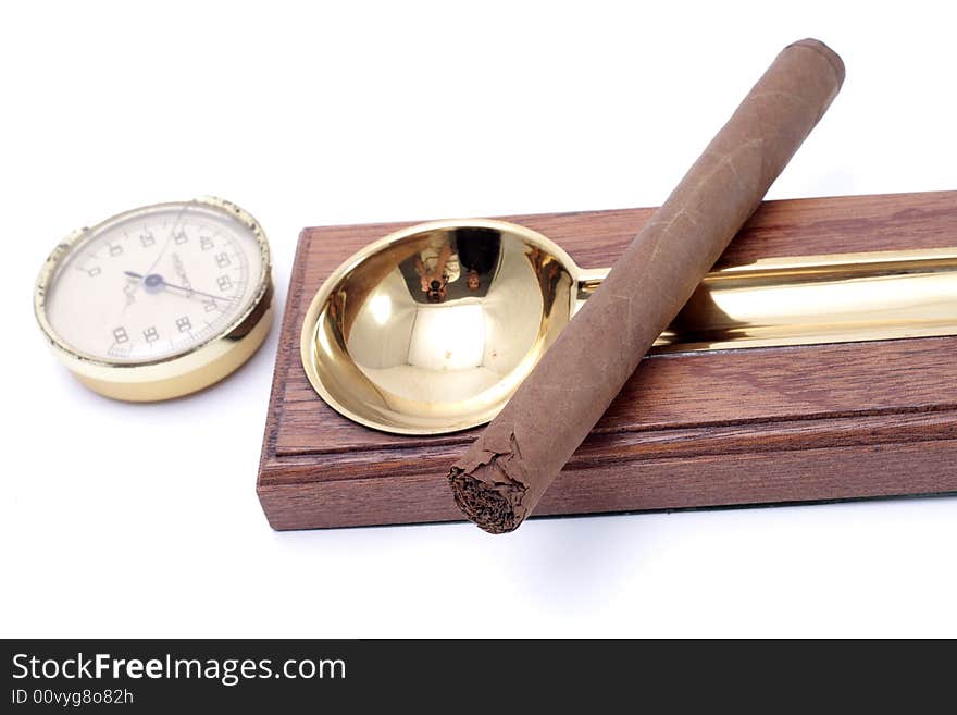 Cigar and ashtray isolated on a white background