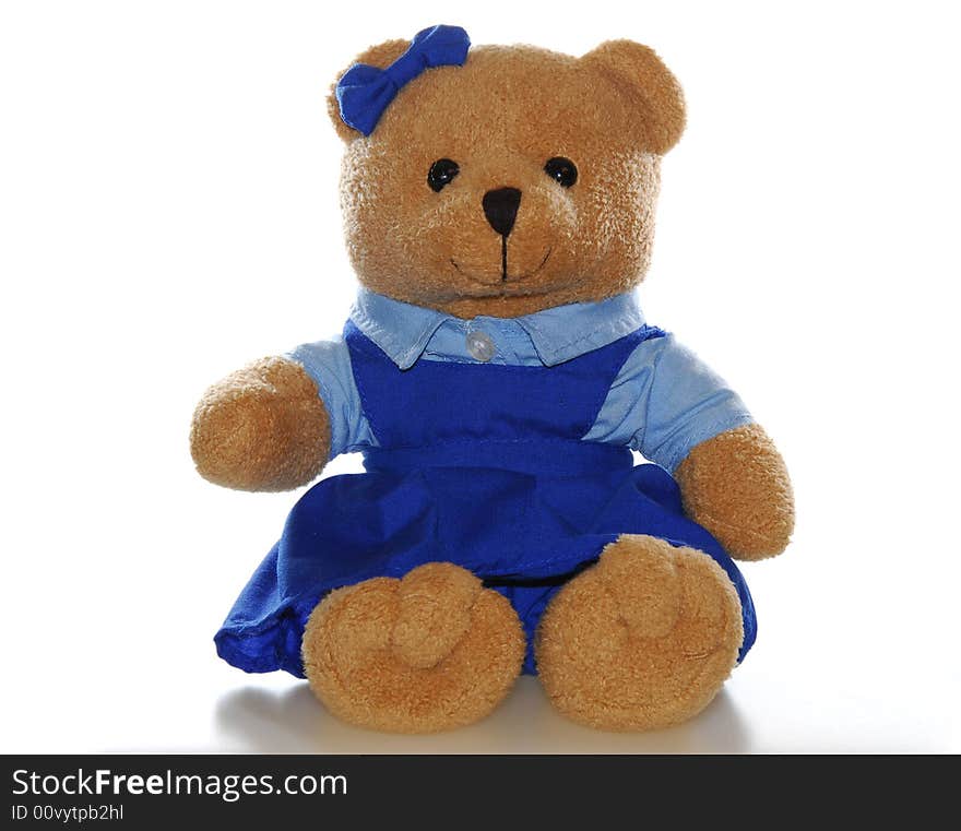 Teddy bear in school uniform