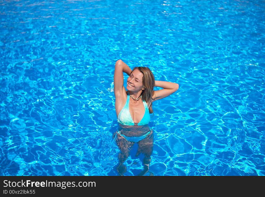 Attractive woman in the pool. Attractive woman in the pool