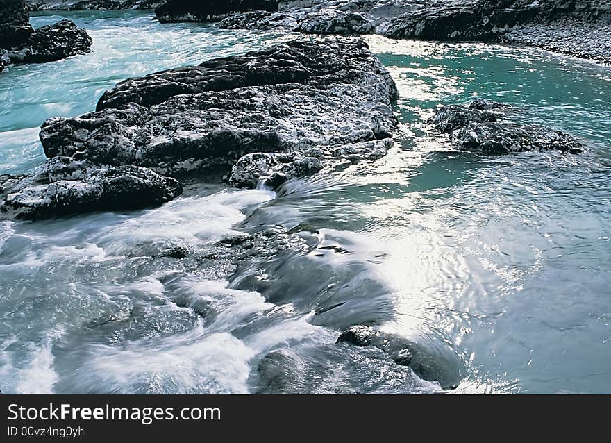 The mountain river with clean water. Photo. The mountain river with clean water. Photo.