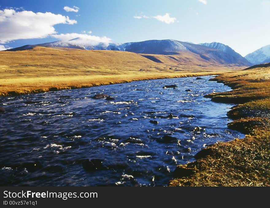 The mountain river with clean water. Photo. The mountain river with clean water. Photo.