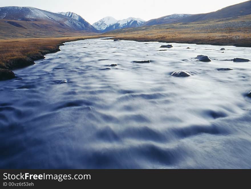 The mountain river with clean water. Photo. The mountain river with clean water. Photo.