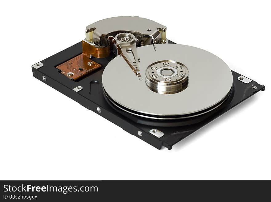 Disassembled hard disc isolated on white. Disassembled hard disc isolated on white