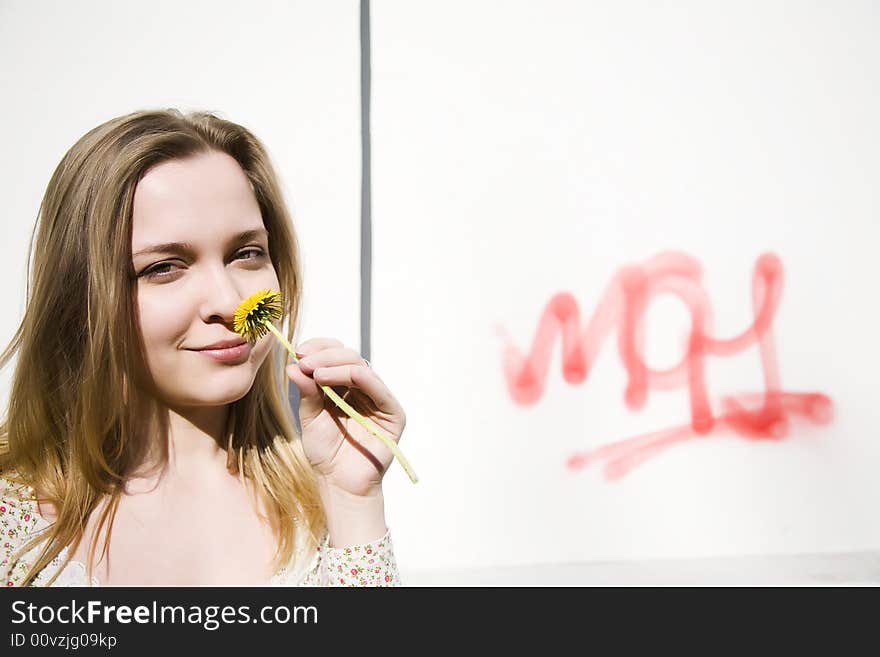 Woman with first spring flower. Woman with first spring flower