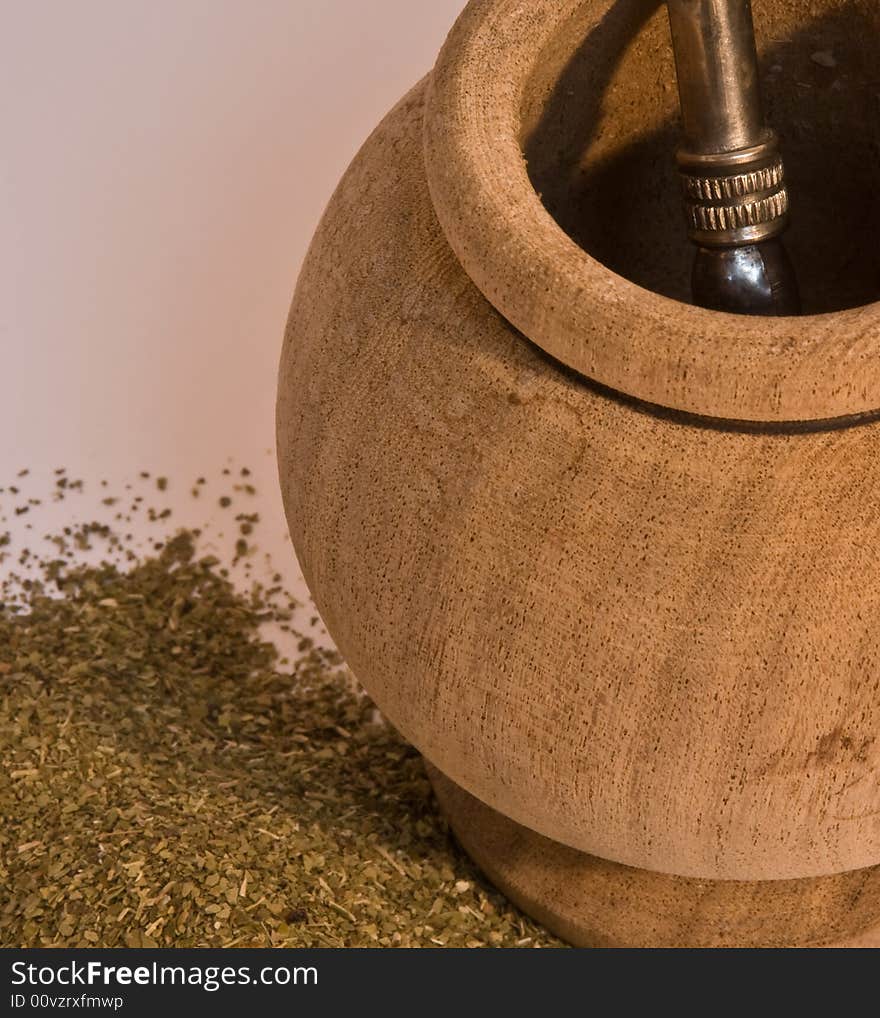 Photo of a mate, yerba and a bombilla. This drik is usually consumed in south america and is a sort of tea. Photo of a mate, yerba and a bombilla. This drik is usually consumed in south america and is a sort of tea