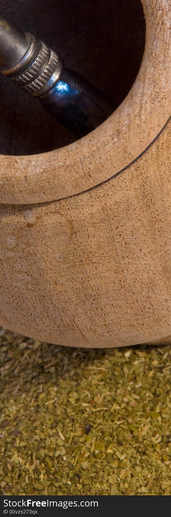 Photo of a mate, yerba and a bombilla. This drik is usually consumed in south america and is a sort of tea. Photo of a mate, yerba and a bombilla. This drik is usually consumed in south america and is a sort of tea