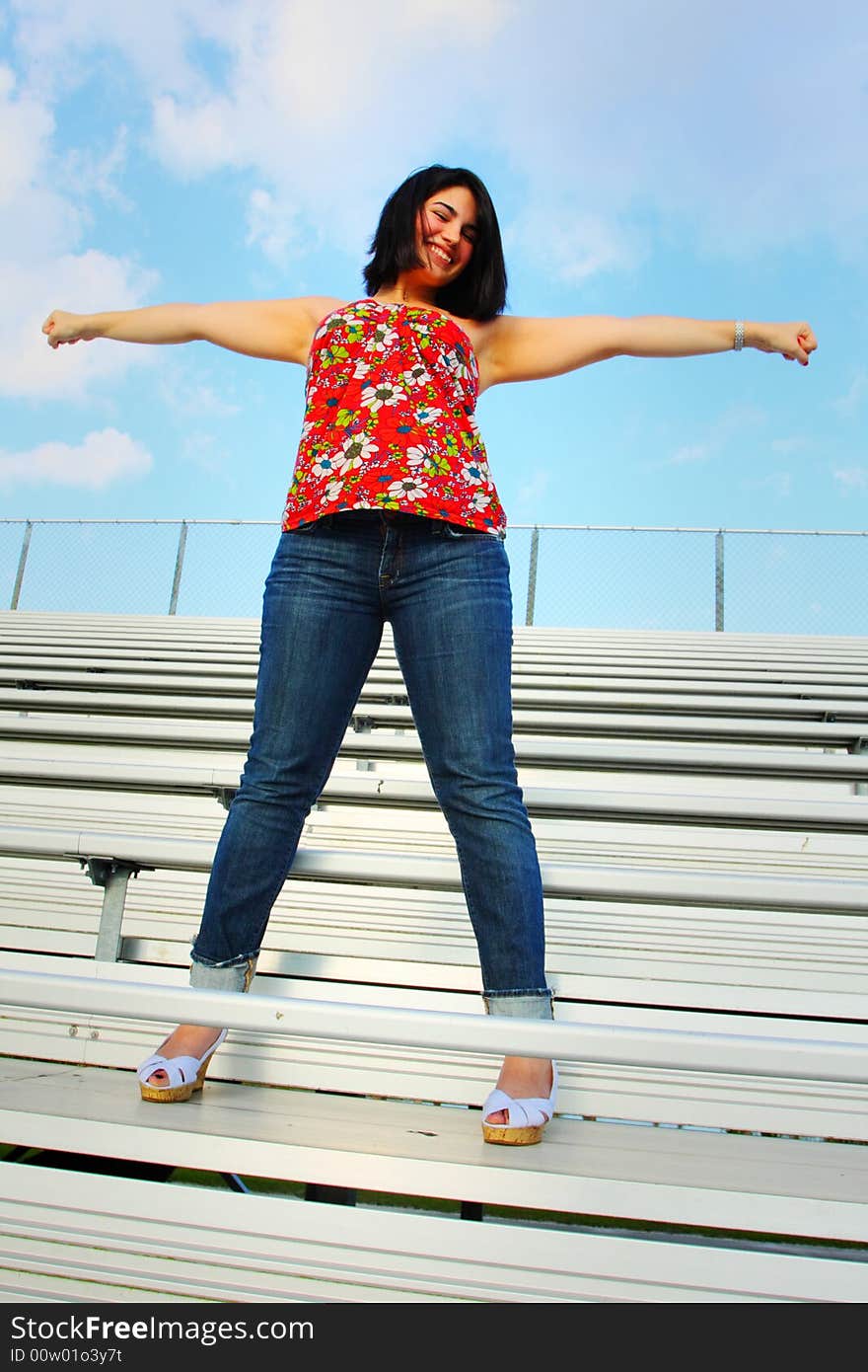 Cheerleader on the bleachers