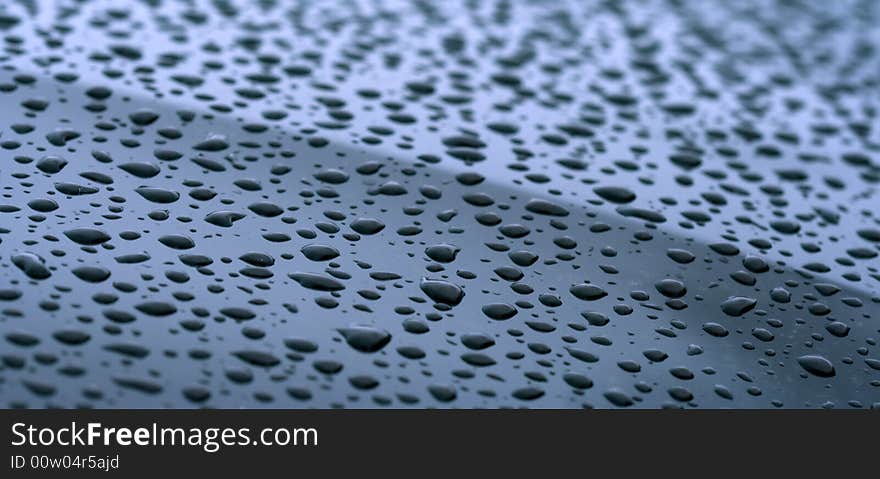 Drops of water at smooth shiny surface. Drops of water at smooth shiny surface