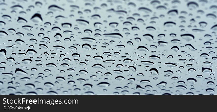 Water drops at glass after rain