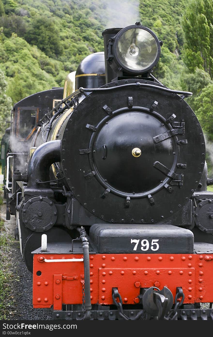 A steam locomotive ready to leave the station - The Kingston Flyer, Queenstown, New Zealand. A steam locomotive ready to leave the station - The Kingston Flyer, Queenstown, New Zealand