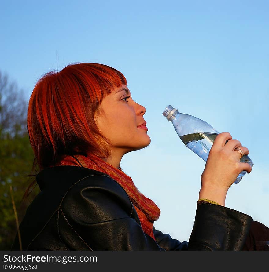 Young Girl Drinks Water