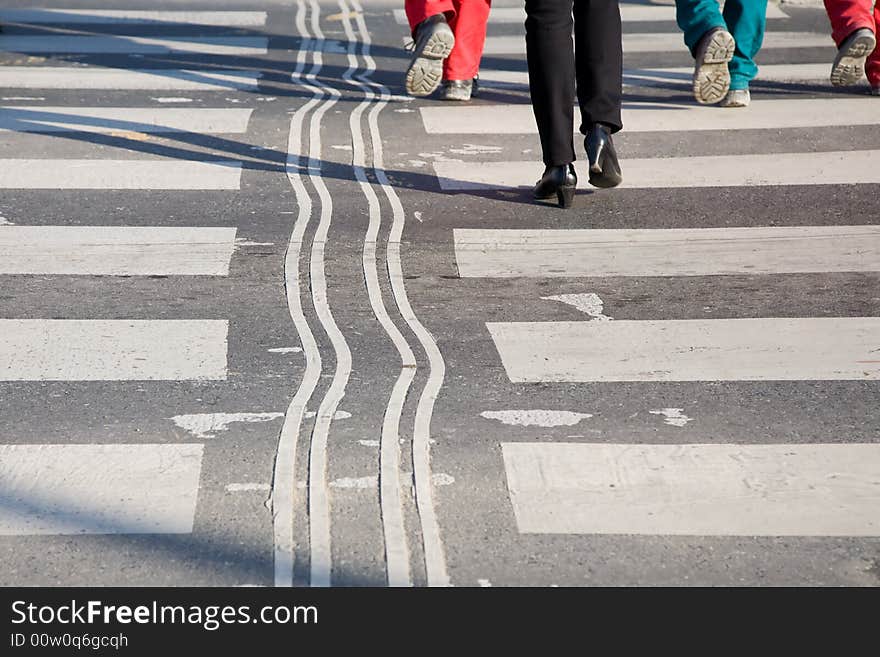 Business woman and workers on the crosswalk with curved guiding line.