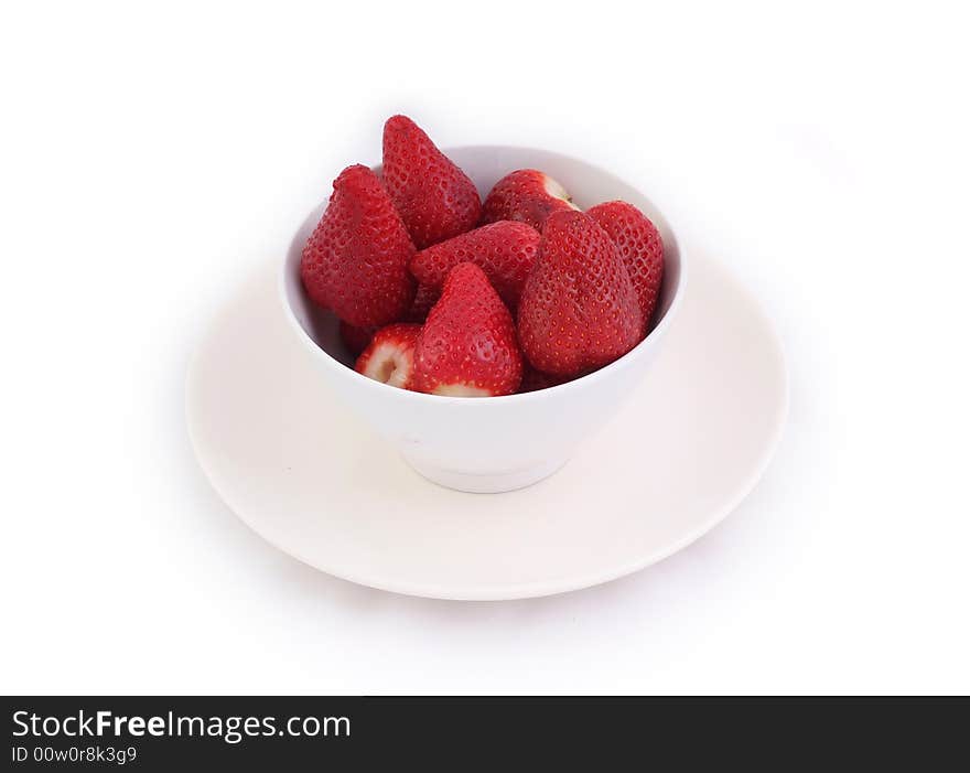 Red fresh and tasty strawberries in white bowl on white background