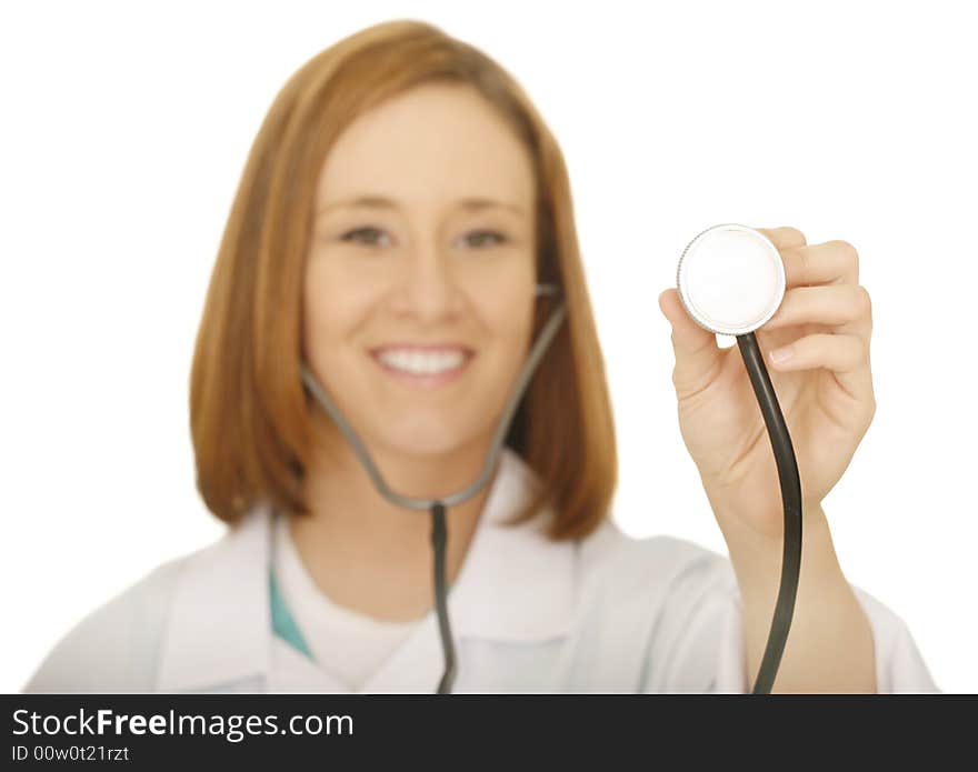 Isolated woman doctor holding up stethoscope. focus on the stethoscope only. Isolated woman doctor holding up stethoscope. focus on the stethoscope only