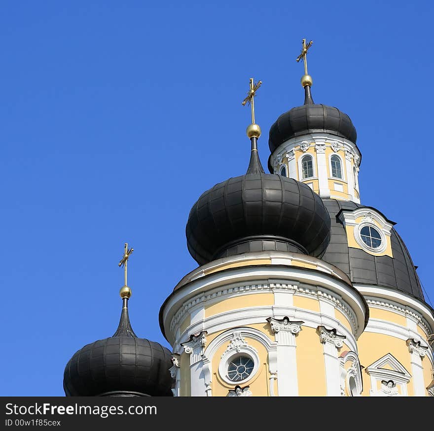 Domes of orthodox church on a blue sky background. St.Petersburg, Russia