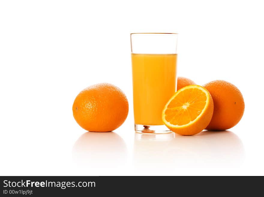 Still-life with orange juice and oranges