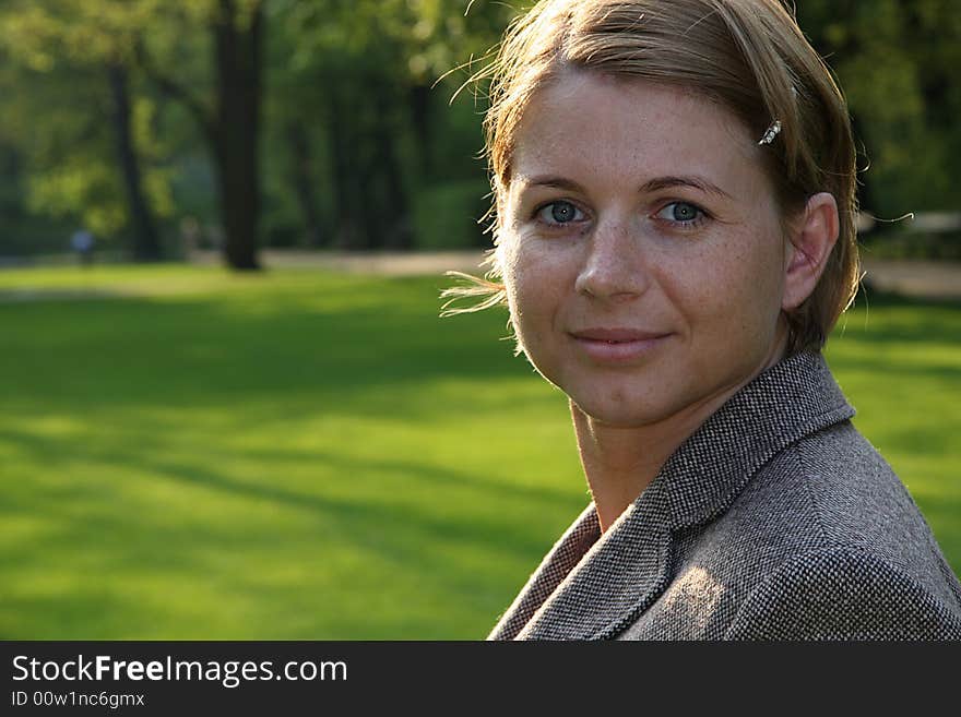 Portrait of young attractive smiling woman, outdoors. Portrait of young attractive smiling woman, outdoors.