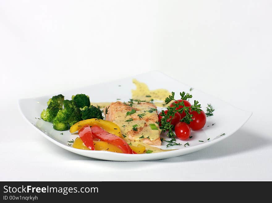 Dinner plate of baked salmon. Dinner plate of baked salmon