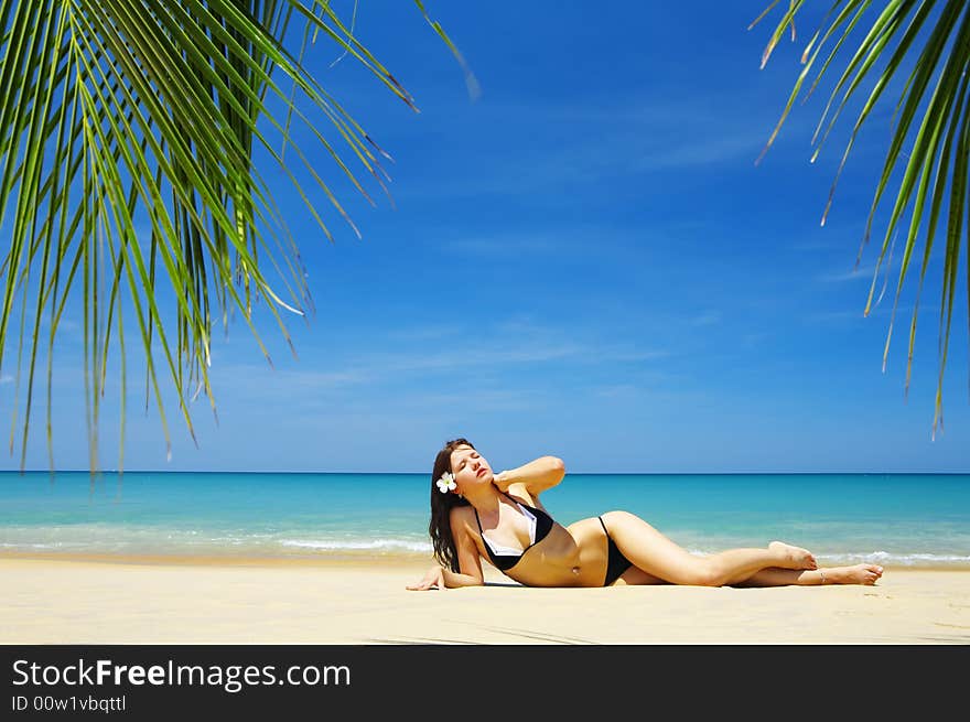 View of a nice  young female in tropical environment. View of a nice  young female in tropical environment