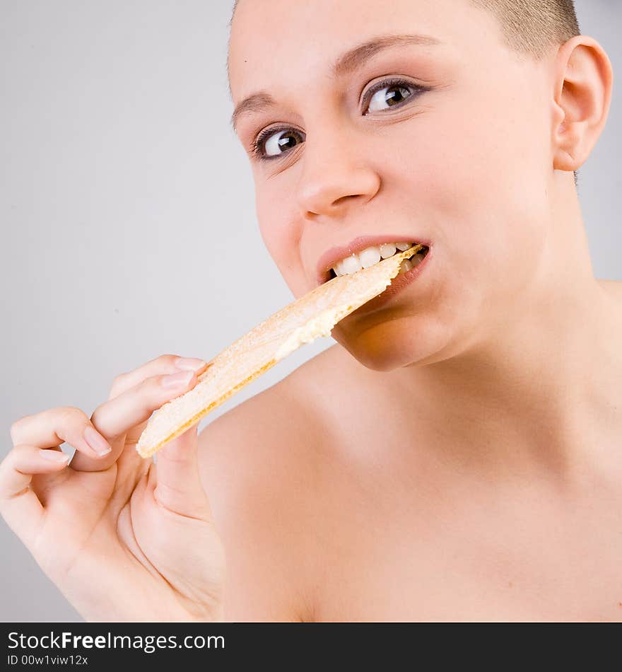 Young good looking woman with a ice cream on her head. Young good looking woman with a ice cream on her head