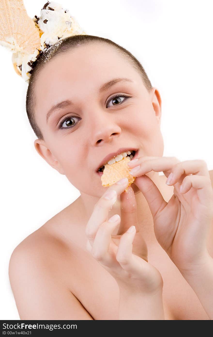 Young good looking woman with a ice cream on her head. Young good looking woman with a ice cream on her head