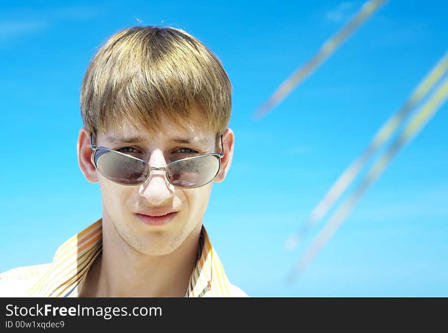 Portrait of young gorgeous male in outdoor environment. Portrait of young gorgeous male in outdoor environment