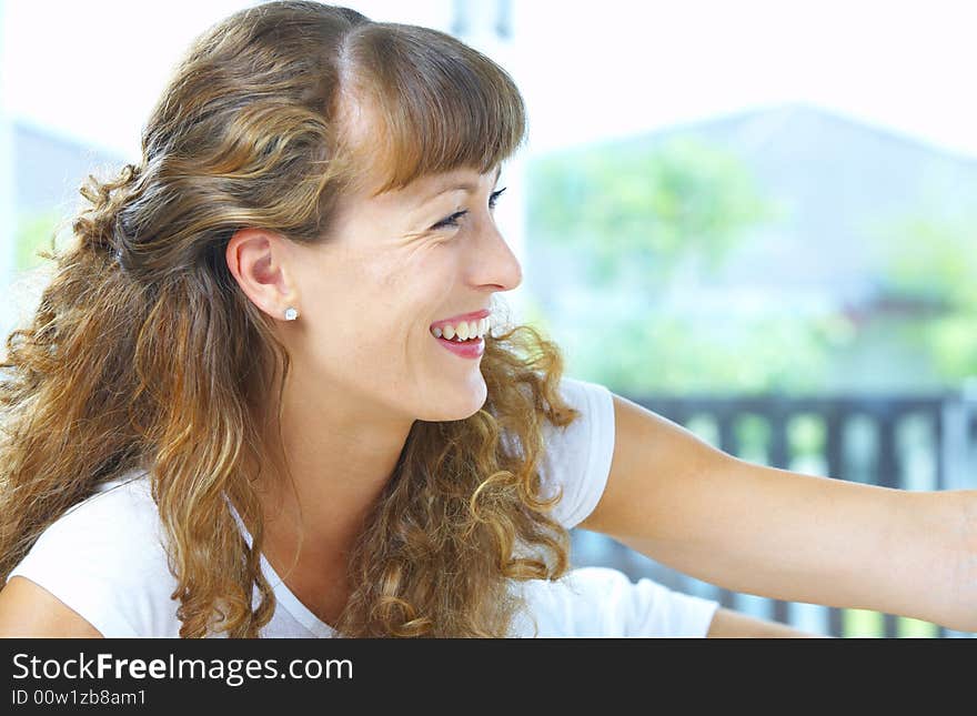 High-key portrait of young blue eyed woman on color back. High-key portrait of young blue eyed woman on color back