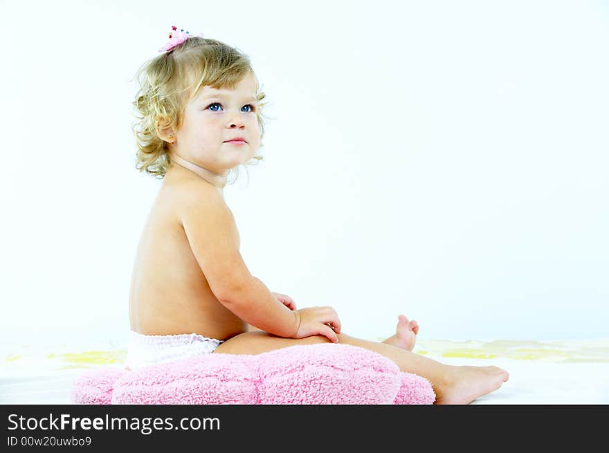 High key portrait of young blue eyed baby. High key portrait of young blue eyed baby