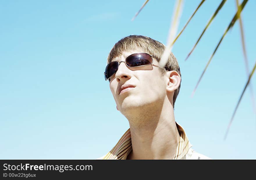 Portrait of young gorgeous male in outdoor environment. Portrait of young gorgeous male in outdoor environment