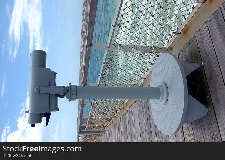 Photographed binocular viewer on fishing pier in florida. Photographed binocular viewer on fishing pier in florida