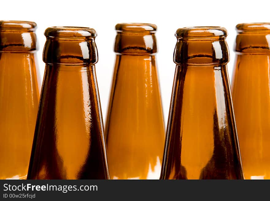 Close-up of two row of beer bottles