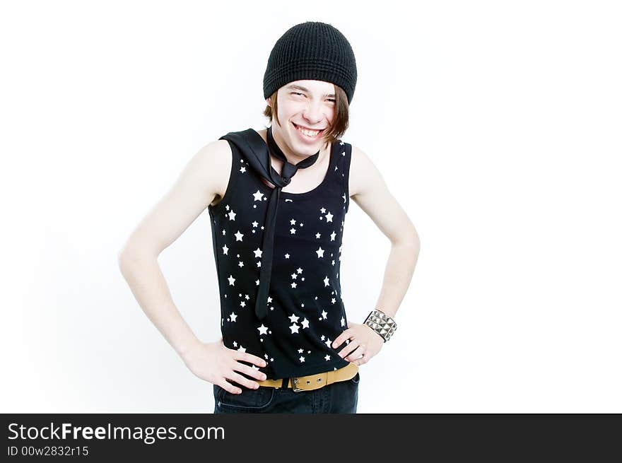 Emotional teenager in black hat smiling, isolated on white background