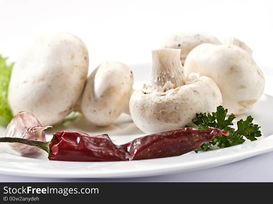 Food serias: some mushrooms on the white plate