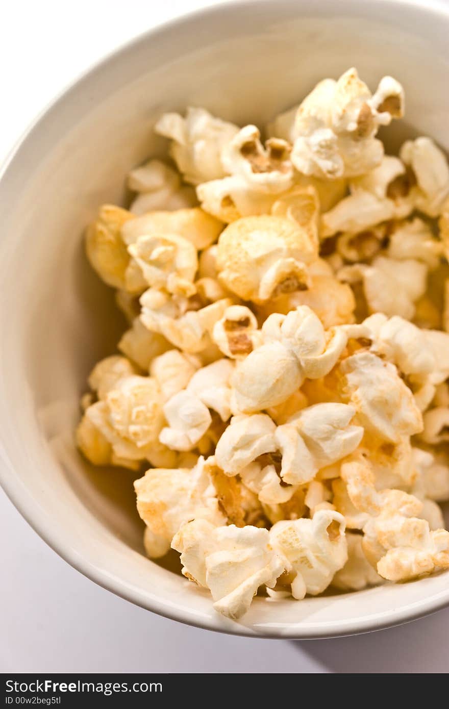 Food series: macro picture of popcorn on the bowl