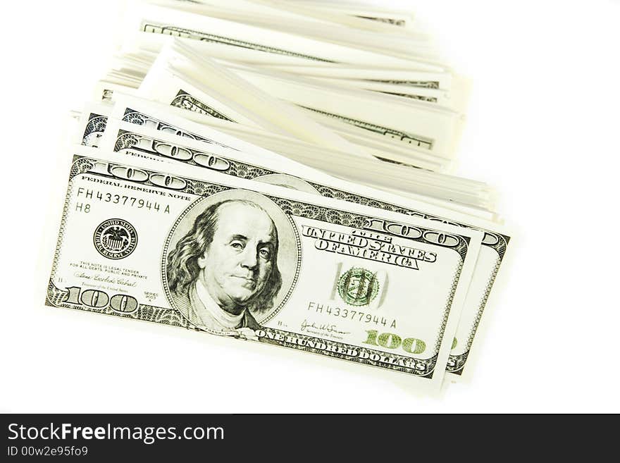 Stack of $100 bills in US currency on white background. Stack of $100 bills in US currency on white background