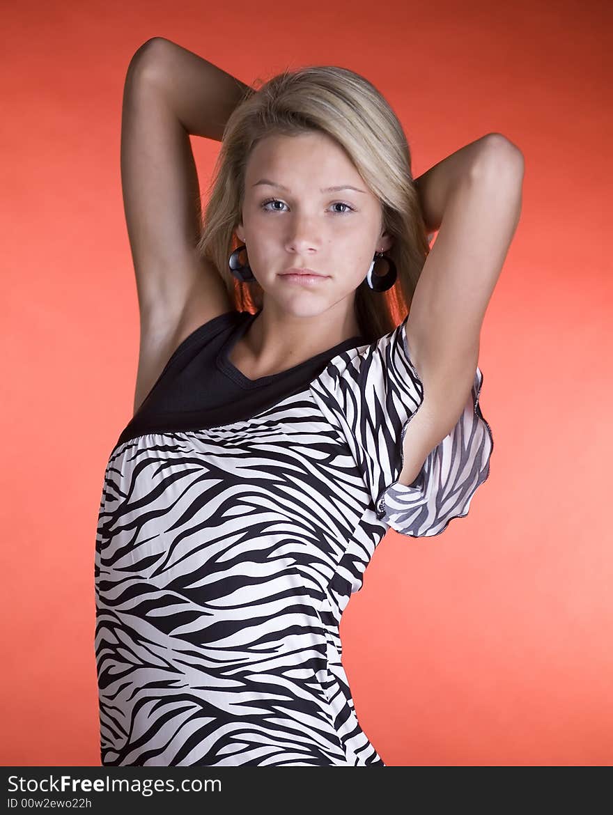 A young teenage girl posing for a fashion shoot. A young teenage girl posing for a fashion shoot