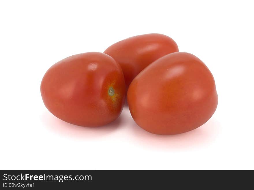 Three tomatoes isolated on white with shadow