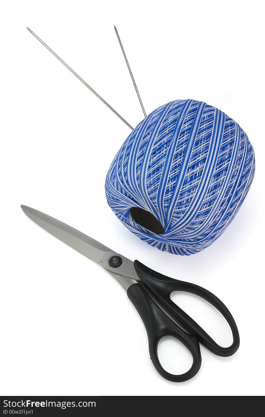 Knitting needles, ball of thread and scissors, isolated on white with shadow