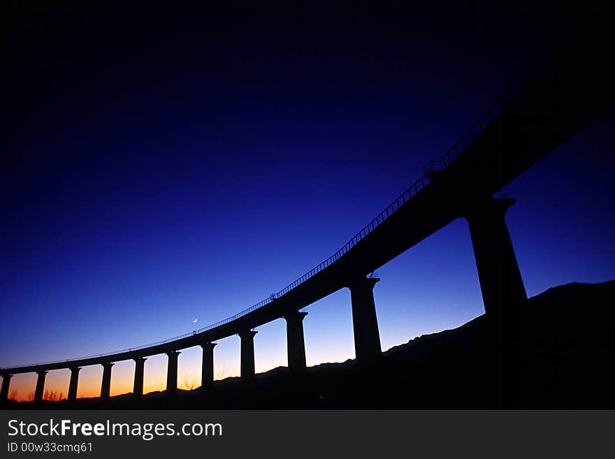 Silhouette of a bridge in morning light. Silhouette of a bridge in morning light