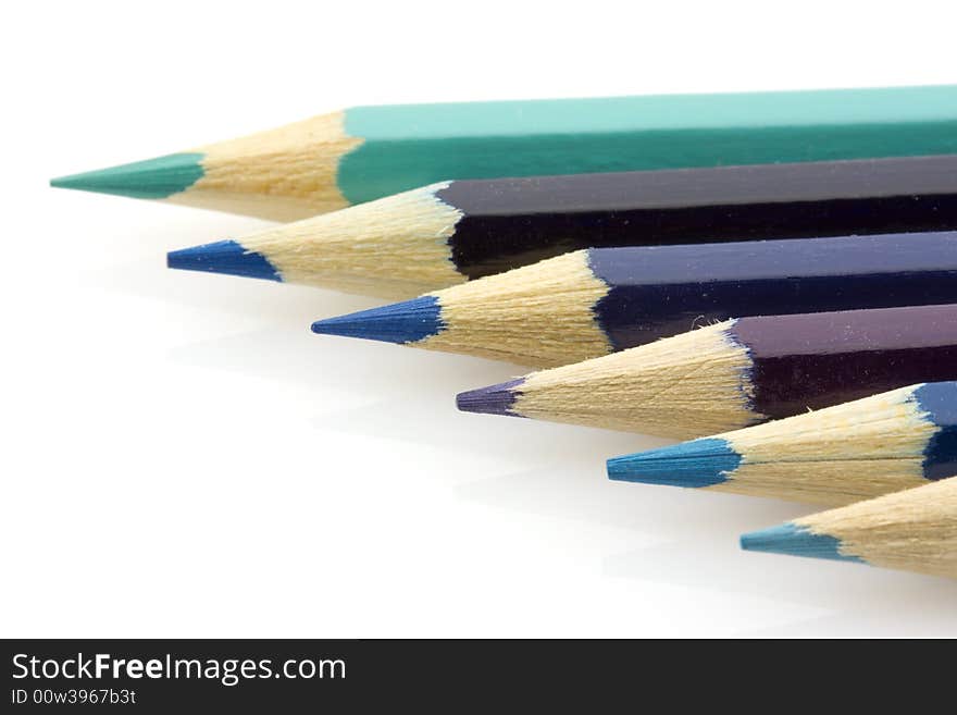 Row of blue pencils, isolated