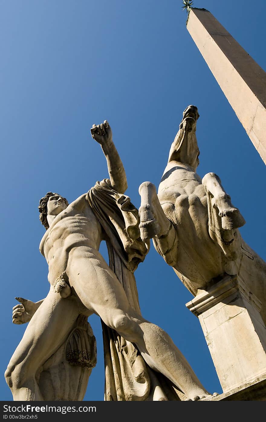 Ancient sculpture in Rome on blue sky. Ancient sculpture in Rome on blue sky