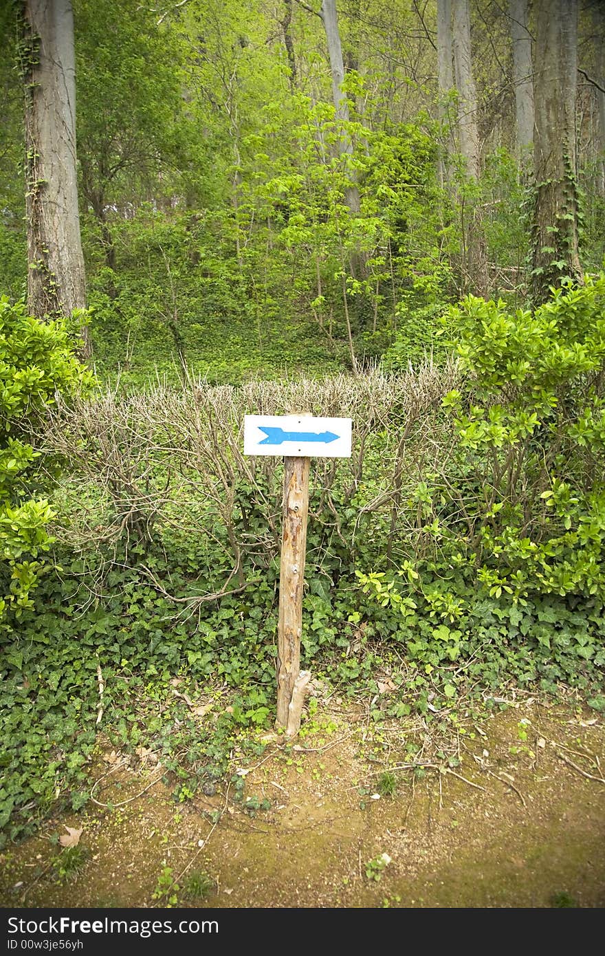 Direction sign with an arrow at a spanish path. Direction sign with an arrow at a spanish path