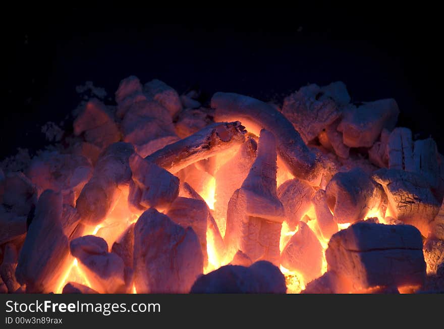 Live coals in evening garden