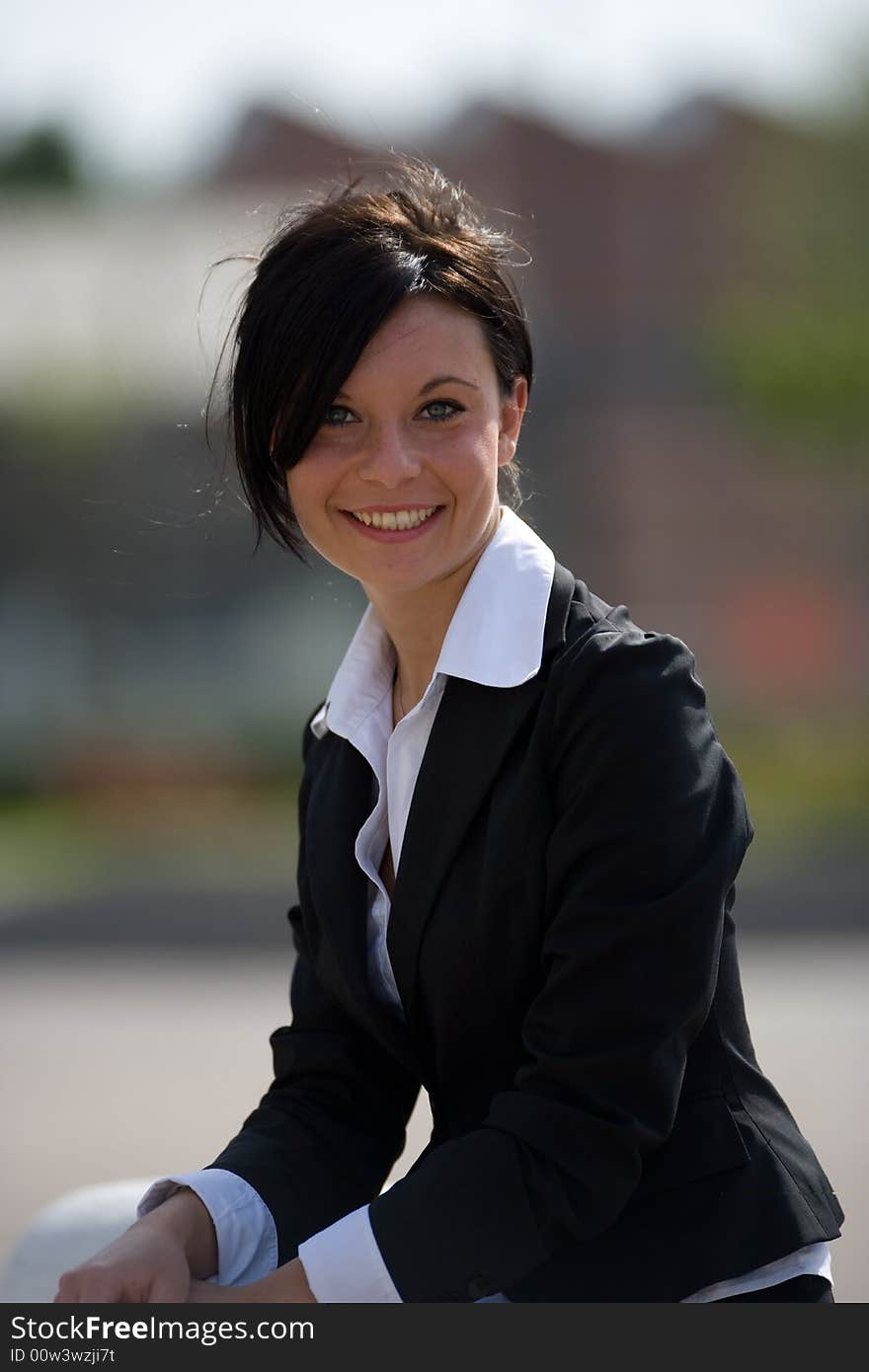 A young adult smiling portrait with office suit. A young adult smiling portrait with office suit