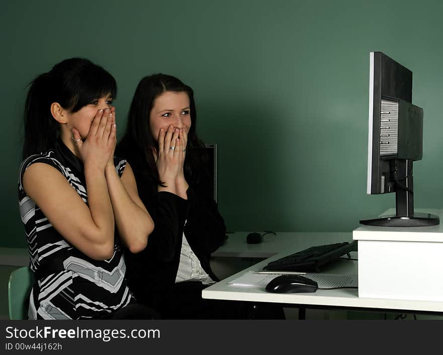 Two girls at the computer