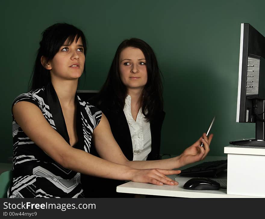 Two girls at the computer