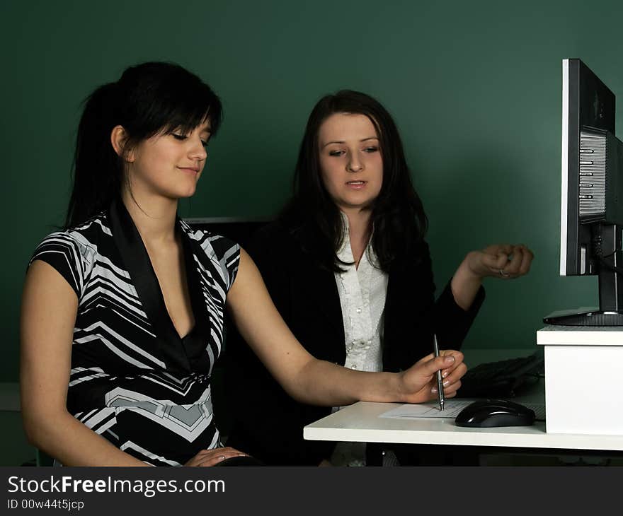 Two girls at the computer