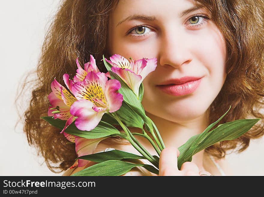 Beautiful girl with flowers